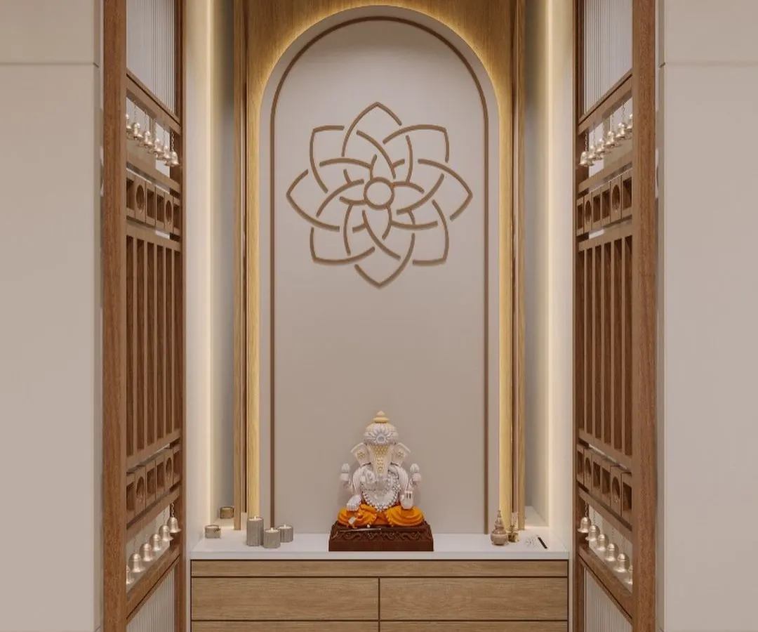 This is a 3D visualization of a Pooja unit I designed. The goal was to create a tranquil and spiritually uplifting space, incorporating an elegant arched niche, soft backlighting, and intricate wooden jaali doors, all while adhering to Vastu principles for sacred spaces.