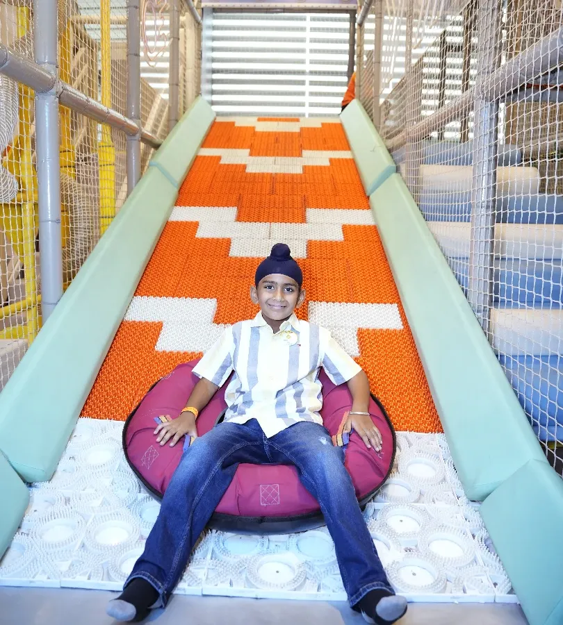 Get ready for our crowd favorite, the Donut Slide. Kids love the thrill of sliding down on these comfy tubes, and they always come back for more.