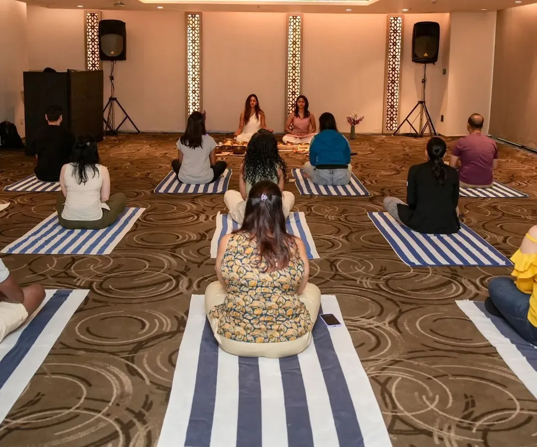 Here I am leading a corporate wellness session that combines sound healing and gentle yoga. It’s a wonderful way for teams to de-stress, reconnect, and bring a sense of balance into their workday.