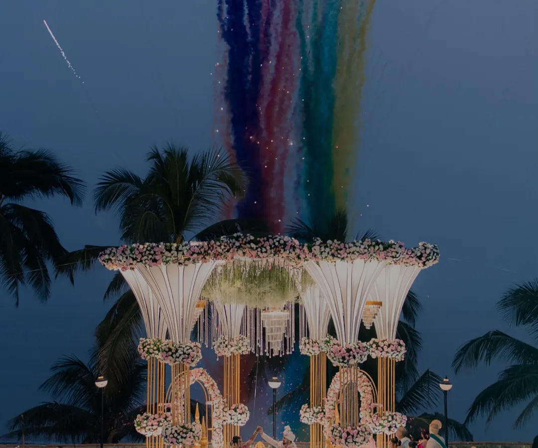 We specialize in capturing the grandeur of your wedding day. This shot from a Maharashtrian beach wedding shows how we frame the scale and beauty of your ceremony, creating an image that is both epic and personal.