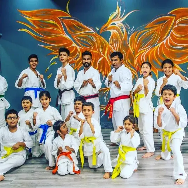 Our dojo is a family, open to everyone. This photo from our Kyu grading at the Marathahalli dojo shows students of all ages and belt levels, from young kids with yellow belts to experienced adults, all training together with focus and a lot of energy.