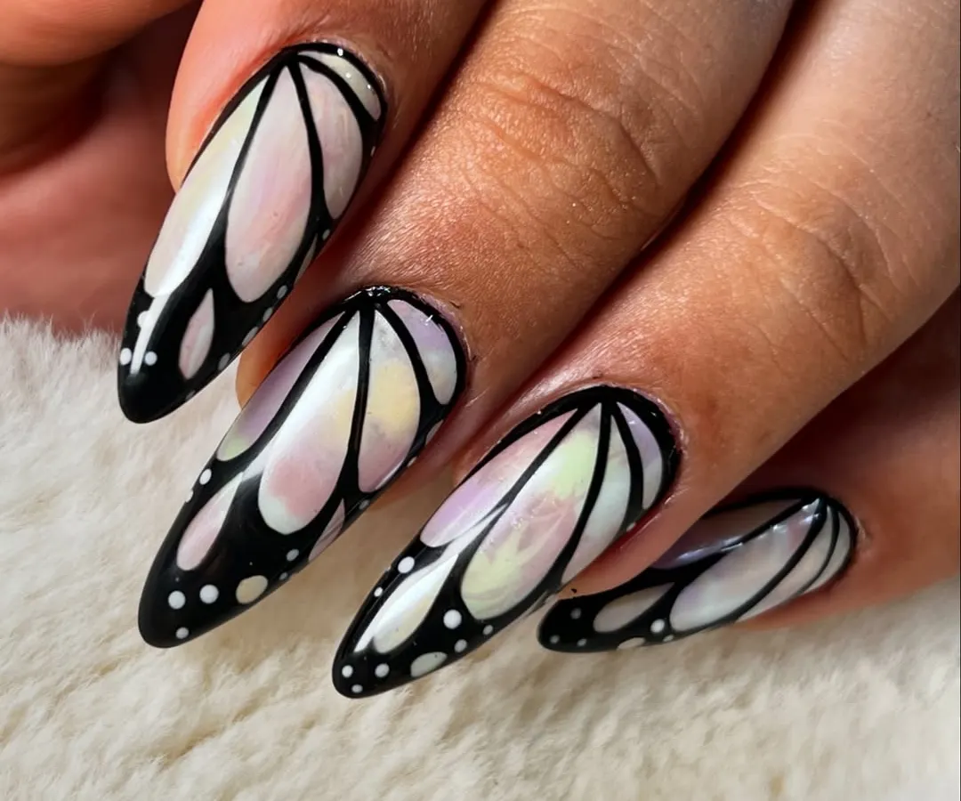 This iridescent butterfly wing design is a perfect example of the trendy, advanced nail art techniques you can master at my academy. We focus on creating clean lines and stunning visual effects that will make your portfolio stand out.