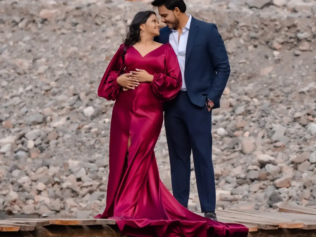 This magenta cocktail dress is one of my most requested custom designs. I styled this look for a maternity shoot, focusing on a silhouette with dramatic bishop sleeves and a long train that flows beautifully for photos.