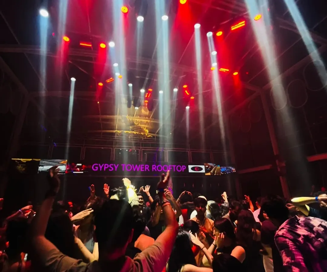 A packed rooftop with hands in the air. I live for these moments. My goal is to create a visual and audio experience with professional lighting and sound that makes the whole club feel like one.