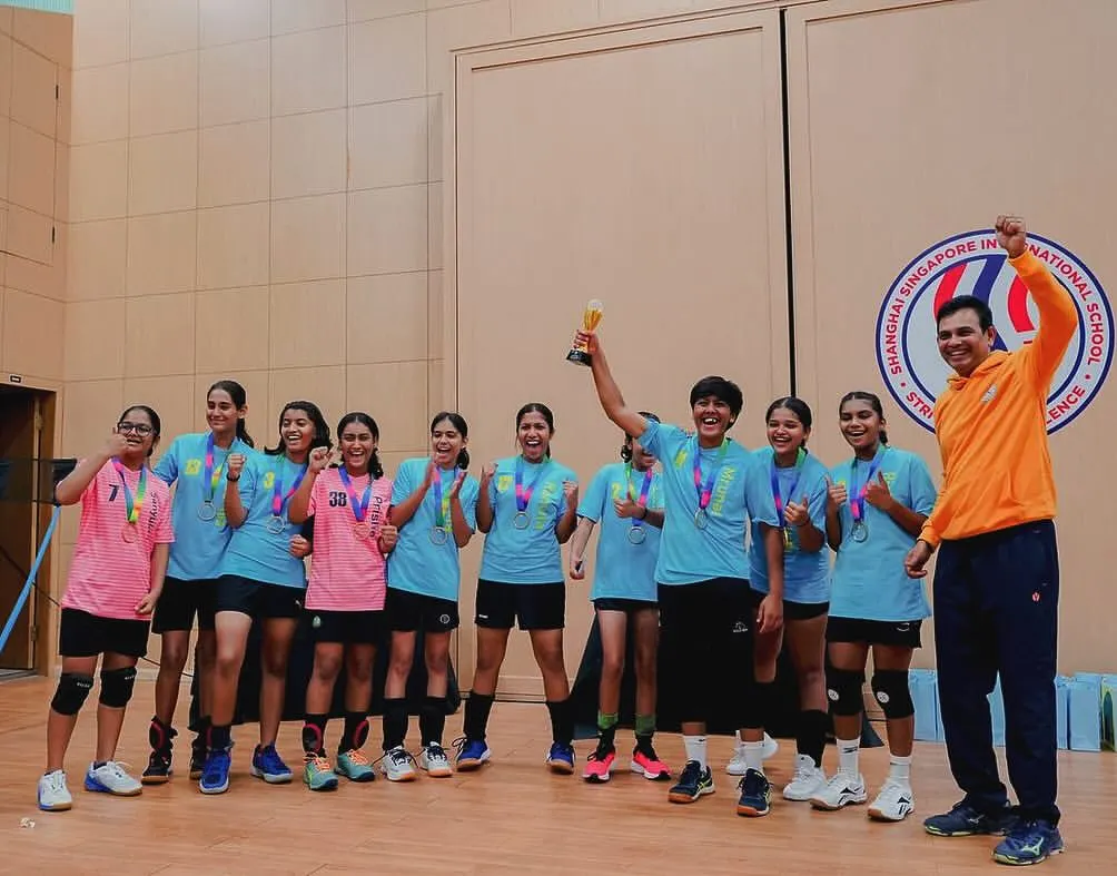 The moment it all becomes real. Pure joy and pride as our girls' team celebrates their championship win at the 2025 FVYL Tournament in Shanghai, trophy held high.