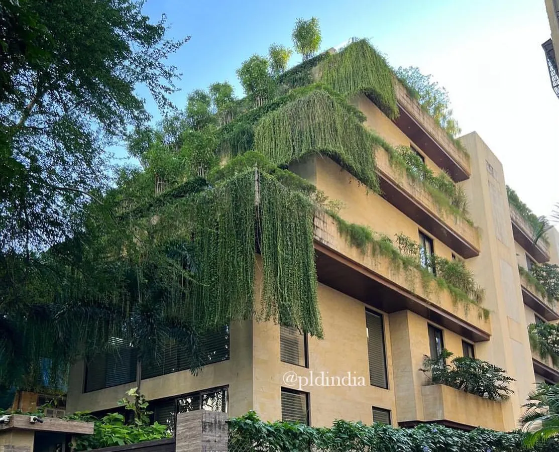 For this family home in Bandra, we created a living facade where greenery spills over each level. This approach to balcony greening turns the building into a vertical garden, offering residents a private natural oasis while softening the building's presence in the neighborhood.