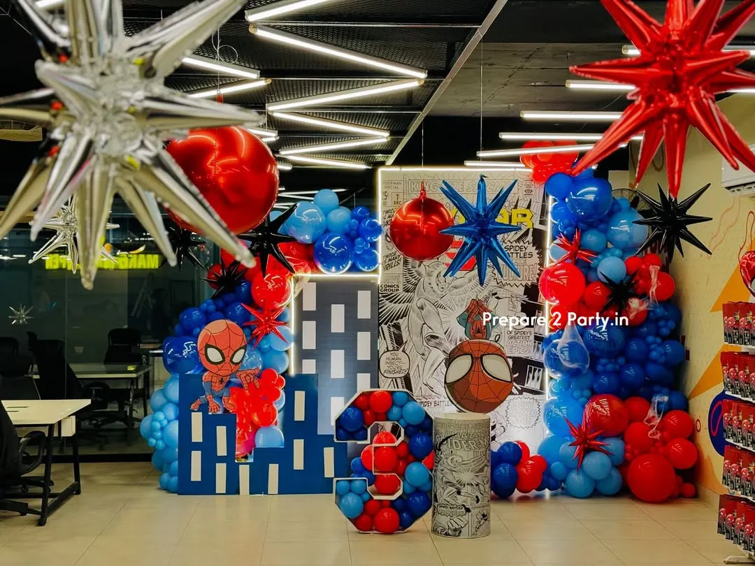 I bring superhero action to life with immersive setups like this Spiderman theme. The decor features a dynamic comic book style backdrop, city building cutouts, and a balloon mosaic number, creating a complete world for the birthday boy.