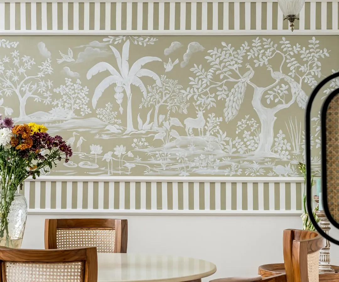I believe in making every kona (corner) tell a story. This hand-painted Rajasthani mural in a dining area is a perfect example. It brings a serene, heritage-inspired narrative to everyday meals, blending traditional art with a modern aesthetic.