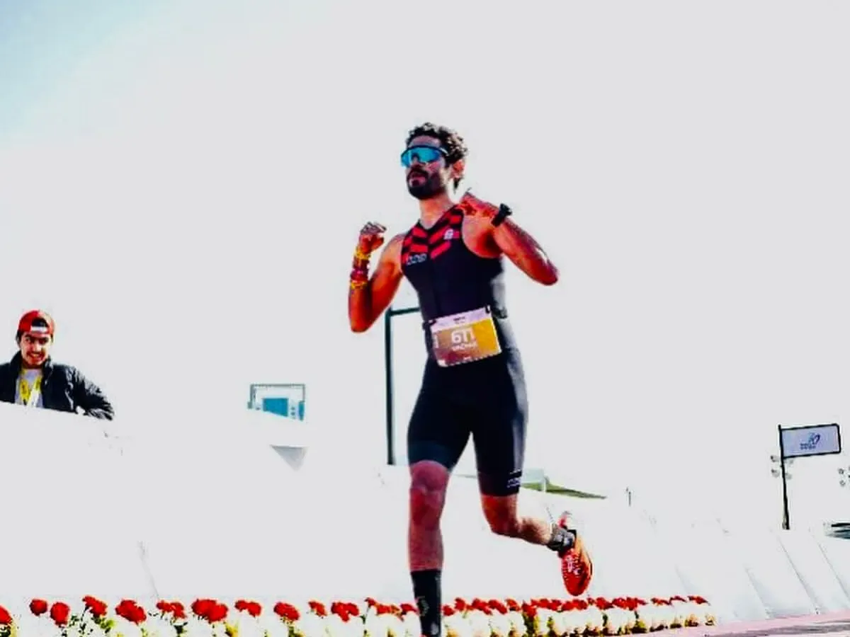 The final push to the finish line. This is the culmination of months of dedicated Ironman training, a moment of pure grit and determination that our entire community celebrates.