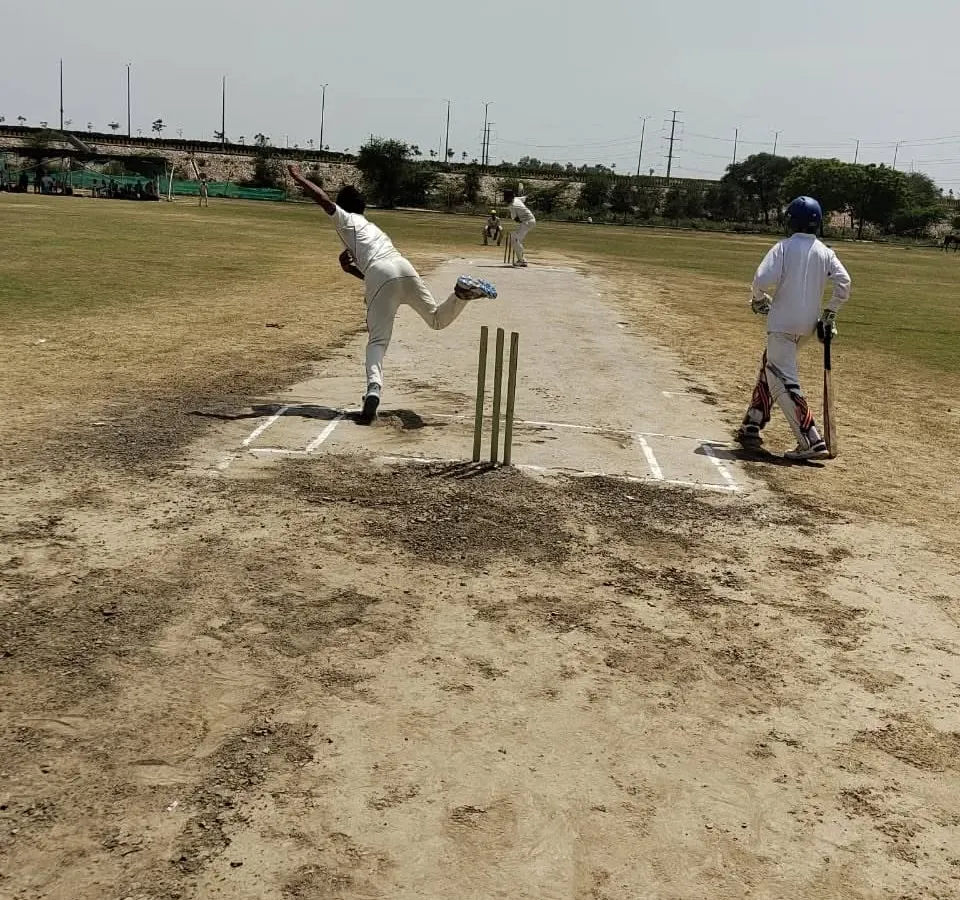 Action during one of our practice matches. We use a well-maintained turf wicket to give our players real match simulation, helping them adapt their bowling and batting techniques to actual game conditions. This is where skills are truly tested.