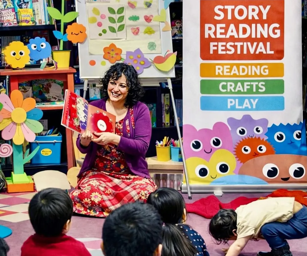 Story time is a magical experience here. In this photo from our Story Reading Festival, you can see me sharing a story with a group of curious little minds. We don't just read; we experience stories through crafts and play to build listening skills, creativity, and a lifelong love for reading.