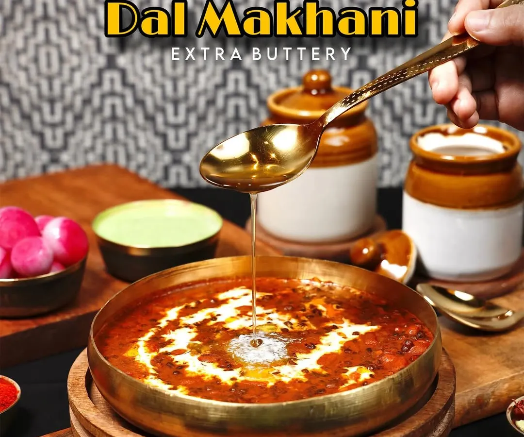 Behold, our extra buttery Dal Makhani. We slow cook it for hours to get that signature creamy texture and top it with a generous spoonful of butter because life is too short for boring dal.