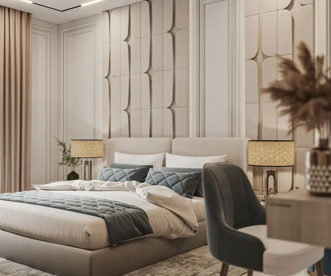 We believe a bedroom should be a personal sanctuary. This space features a fully upholstered bed and a custom-paneled accent wall, creating a serene and sophisticated atmosphere that balances comfort with high-end design.