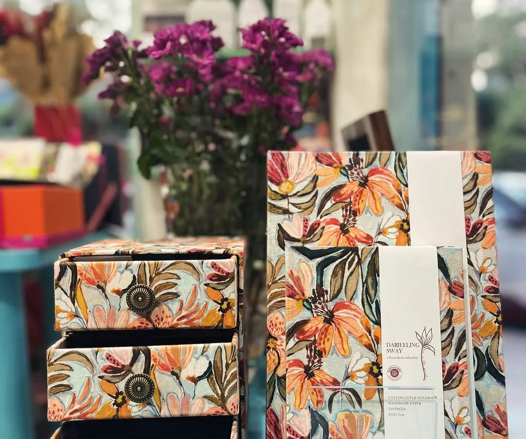Introducing our 'Darjeeling Sway' collection, a soft burst of florals for your space. We designed this print in-house and handcrafted each piece, from desk organizers to keepsake boxes, using pure cotton. It’s a little piece of joy, made with love.