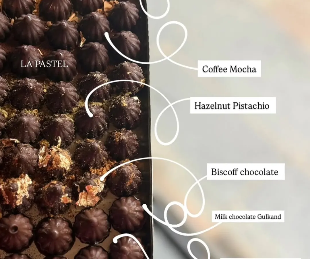 For everyone who loves a modern twist, here's my menu of premium chocolate modaks. I have seven amazing flavours, from Coffee Mocha to White Chocolate Gulkand, so you can find your perfect festive treat. ✨