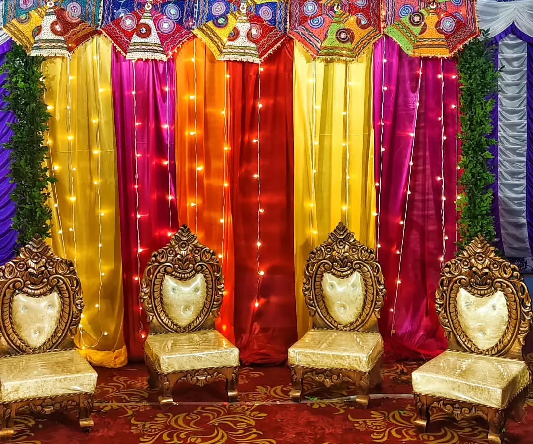 We brought a vibrant Rajasthani theme to life for this Mehndi ceremony. The setup features colorful drapes, traditional embroidered umbrellas, and ornate seating to create a festive and energetic atmosphere.