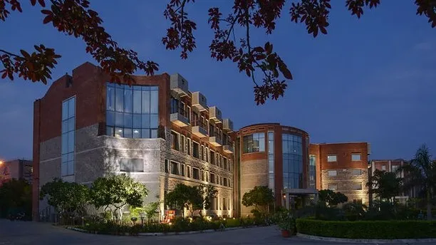 The Institute for Studies in Industrial Development (ISID) in New Delhi, illuminated at dusk. I believe in creating spaces that feel right, and here, the combination of red brick, stone, and thoughtful lighting creates an inviting atmosphere for research and learning. This is an example of sustainable institutional architecture that stands the test of time.