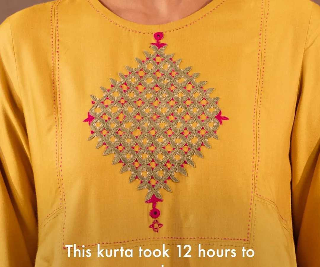 The beauty of our clothing lies in the time and skill invested by our artisans. This particular kurta took over 12 hours of meticulous hand embroidery, a testament to the slow, intentional process that makes each garment a piece of wearable art.