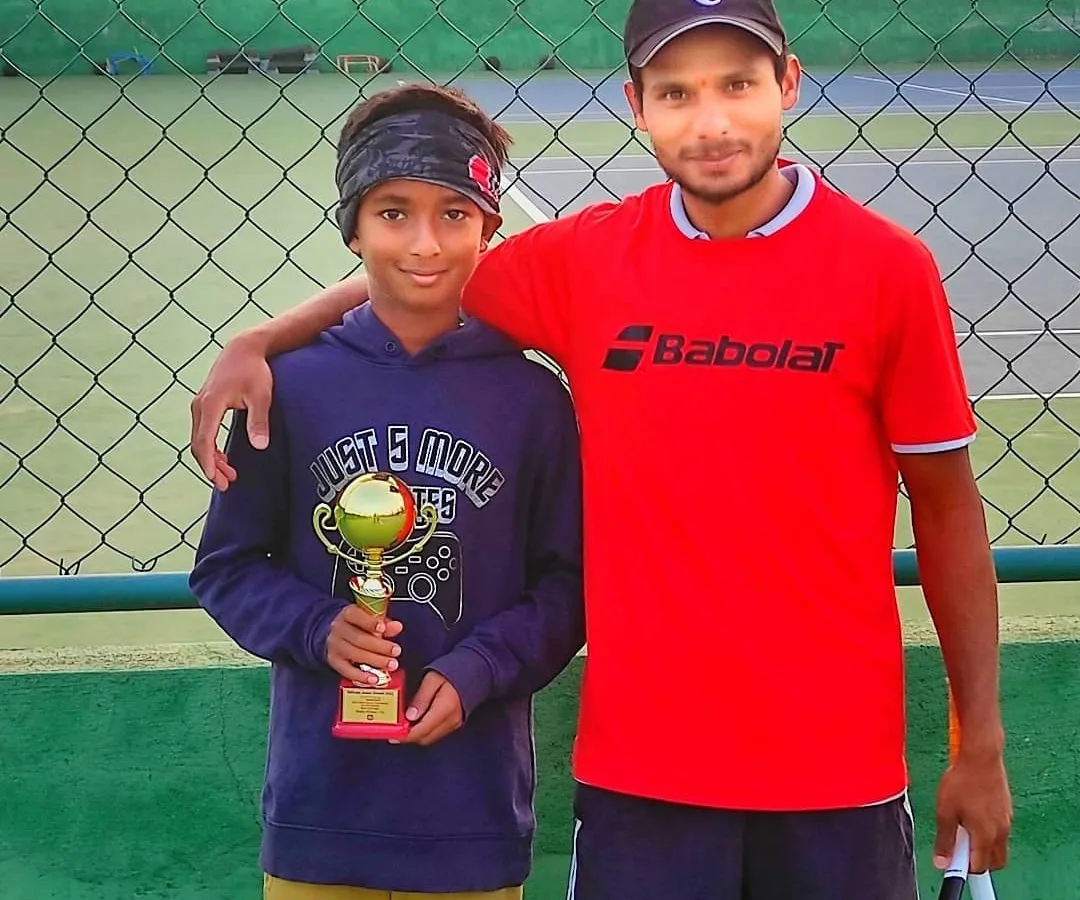 We are incredibly proud of our players' success. Here I am with our student Likith S Gowda after he secured a runner-up position in the U-12 AITA Champion Series tournament.