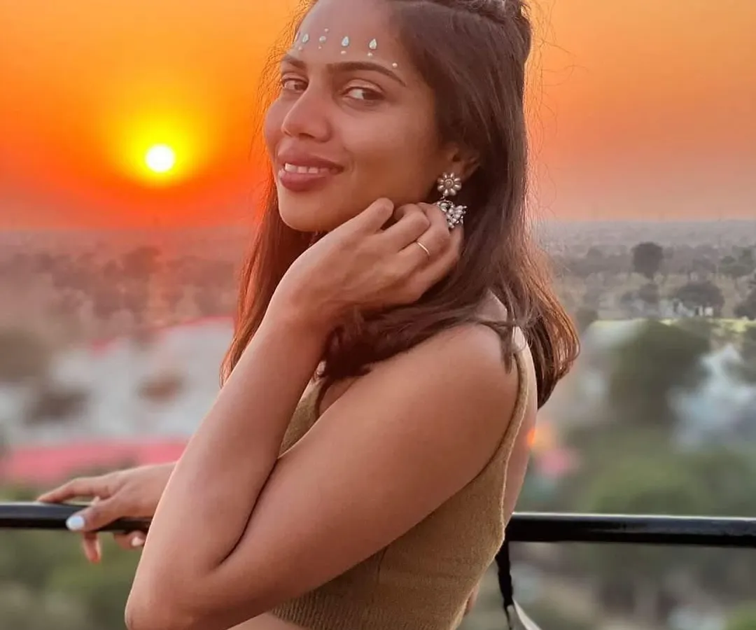 I love this shot from the Magnetic Fields festival. The simple, elegant bindi-style face gems catch the sunset perfectly, creating a beautiful and ethereal festival look.