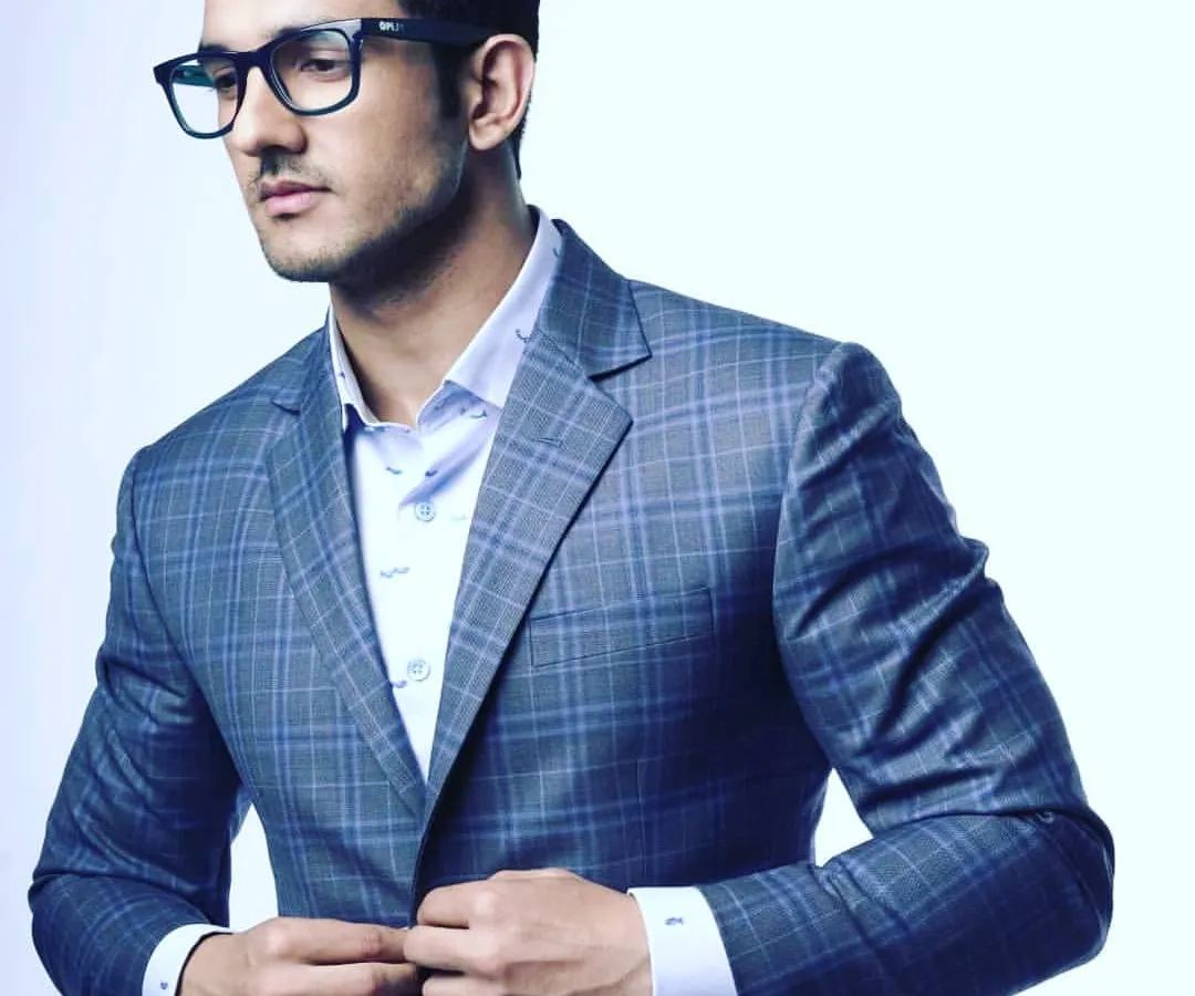 This made to measure plaid suit shows how we can incorporate modern patterns. The jacket is cut to provide a clean silhouette, paired with a custom fitted shirt for complete comfort and style.