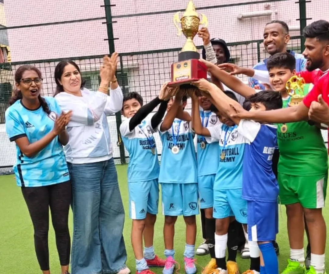 This is the moment we strive for. Our U10 champions celebrating their hard-earned tournament victory, lifting the trophy high. We believe in building a winning mentality through teamwork and dedication.