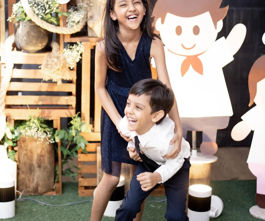 The pure, uninhibited joy of childhood. I love capturing siblings in their element, whether they are sharing a secret or bursting into laughter. These candid portraits are all about freezing the genuine energy and bond that they share.
