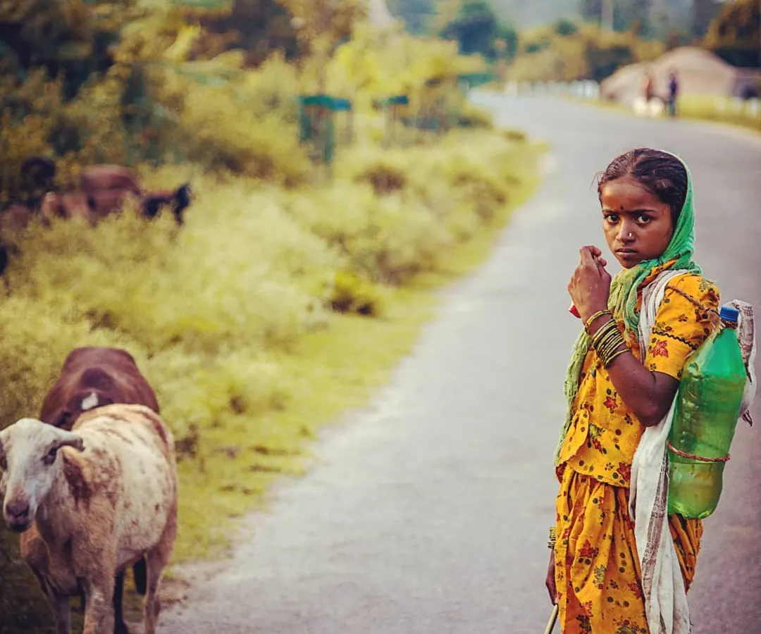 I took this portrait of a young shepherd girl on a road in Hampi. Her direct gaze is so powerful. For me, an artistic individual portrait is about capturing the soul of the person and their connection to the world around them, using natural light to tell their story.