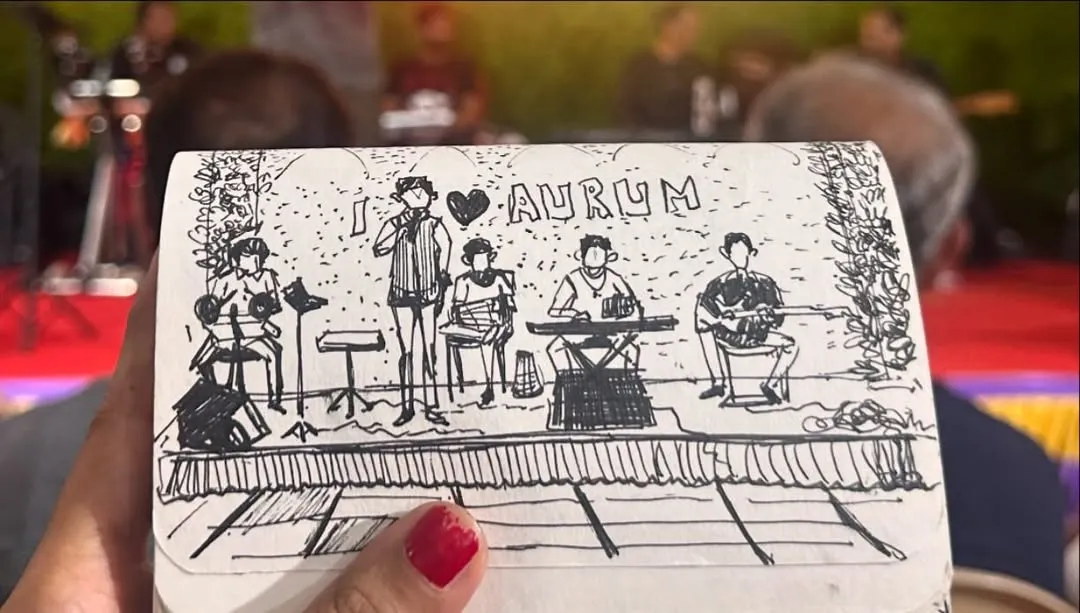 There's nothing like the energy of live music, and I love capturing it in my sketchbook. This is a quick ink drawing I did of an orchestra, capturing the entire band on stage. It shows how I can sketch not just people, but the whole atmosphere of an event.