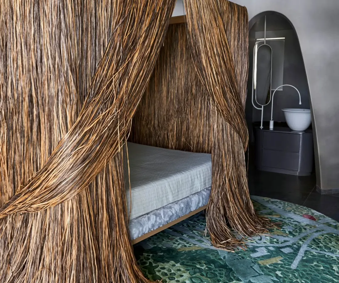 For Project 86, we brought in this incredible cabana bed from Edra, the first of its kind in India. We placed it at an angle, breaking free from the walls to make it a true centerpiece. It’s surrounded by rattan shutters, creating a private, luxurious retreat within the master bedroom.