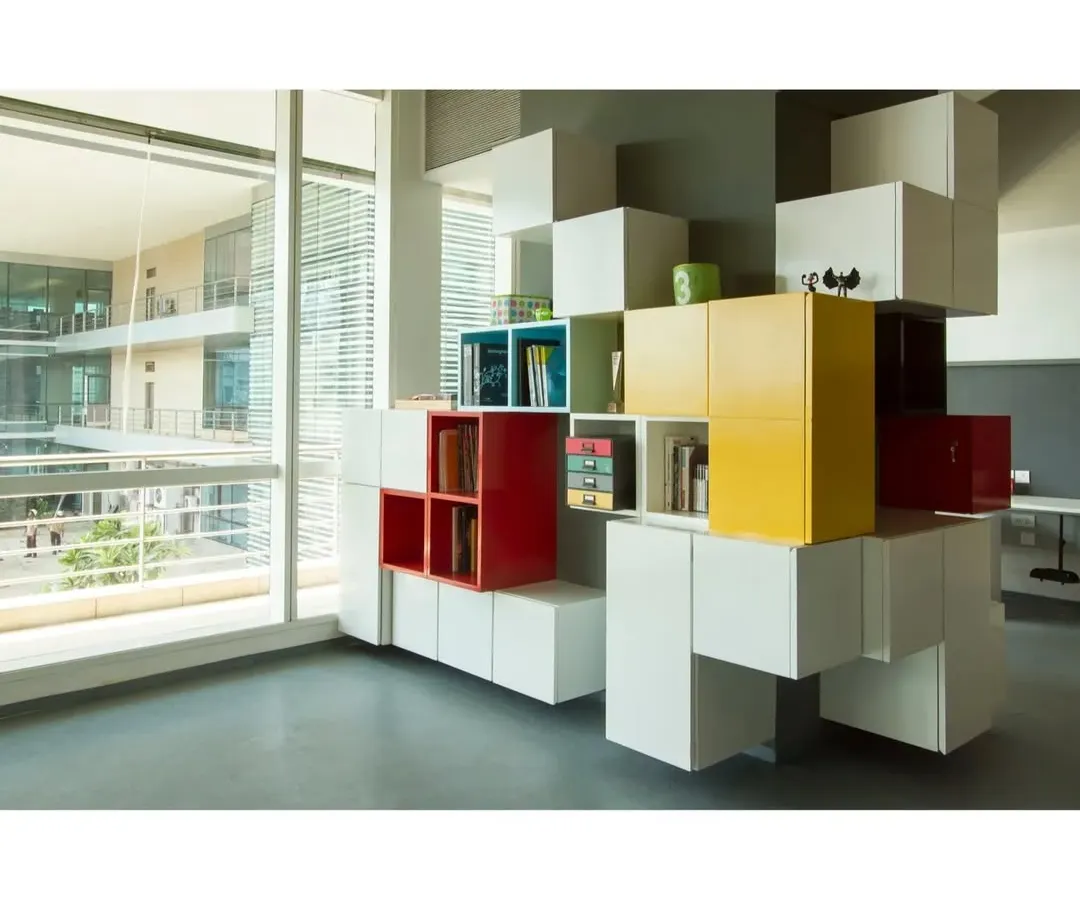 For a digital agency, we had some fun with the idea of 'pixels'. This storage unit isn't just for storing things; it's a playful, three-dimensional feature that brings the company's 8-bit theme to life, wrapping around the building's columns.