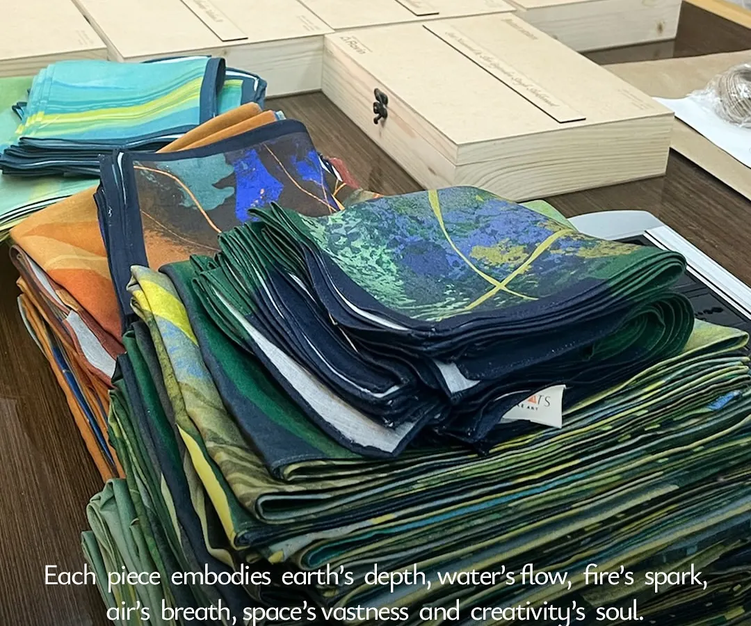 We believe craftsmanship can exist at any scale. Here, we are preparing a large corporate order of our 'Panchabhuta' themed scarves, each one folded with care. Every piece receives the same attention, whether you need ten gifts or three hundred.