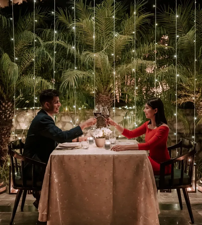 Create a timeless memory with a romantic dinner under a canopy of fairy lights. We specialize in crafting intimate moments like this, where you and your loved one can connect over exquisite food and fine wine in a magical, private setting.