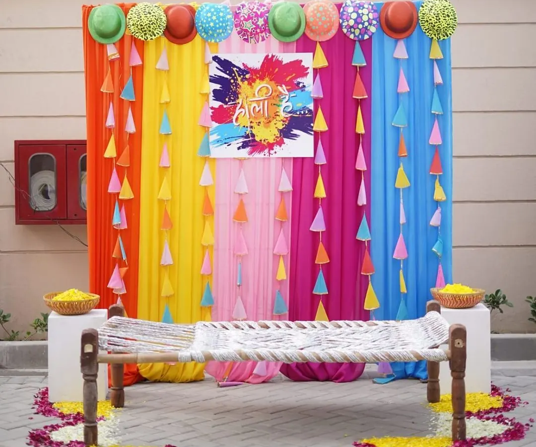 A corporate event should be fun and engaging. I designed this vibrant Holi photo booth with a traditional charpai and a rainbow of colors to create a perfect spot for employees to capture joyful moments and make lasting memories together.
