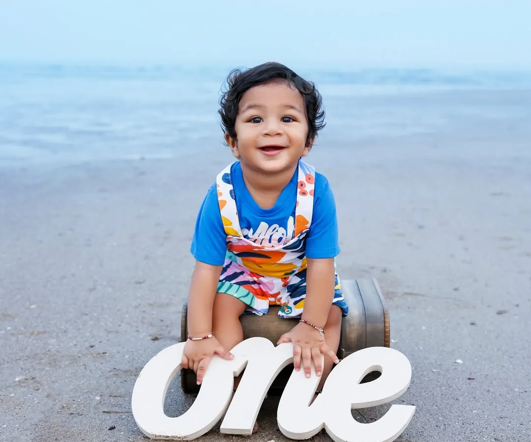 Celebrating a first birthday is a huge milestone, and what better place than the beach? I love using natural light and simple props to keep the focus on your little one's joyful spirit. This outdoor baby photoshoot is perfect for capturing their personality.