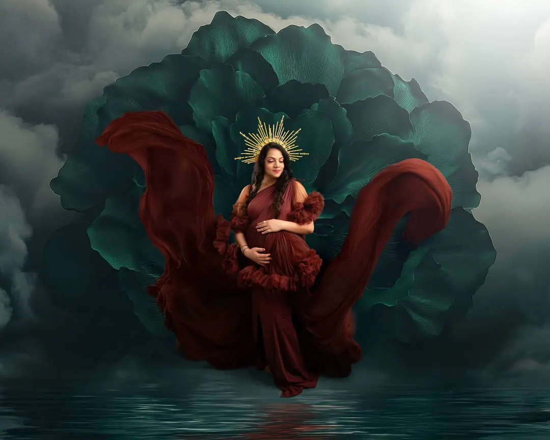 Embrace your inner goddess with a dramatic, contemporary portrait. I use flowing fabrics and artistic lighting to create powerful, fine art images that celebrate the strength and beauty of your pregnancy.