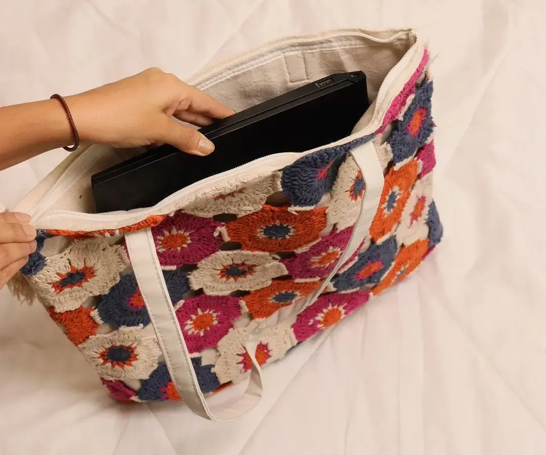 Many customers ask if this tote can hold a laptop, and the answer is yes. Here you can see how easily a standard laptop fits inside, with a secure zip closure to keep everything safe. It’s a stylish and practical handmade laptop bag.
