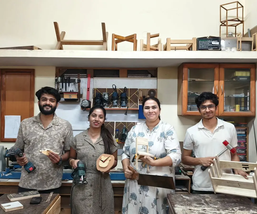 Look at these smiles. This is what a typical weekend at the workshop looks like. People from all walks of life, most with zero prior experience, holding something they built with their own hands. We made everything from clocks to small tables this day.