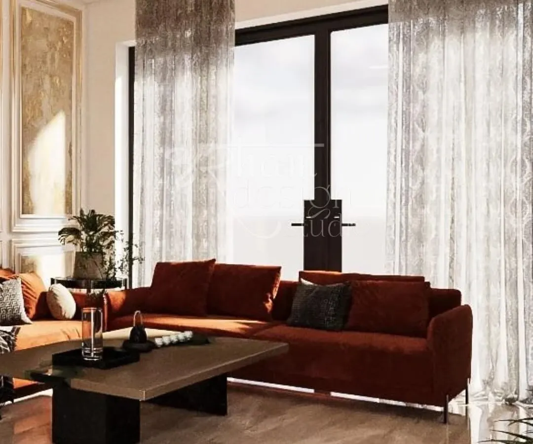 This sunlit living room is part of a vacation home I designed for a family from Kashmir. They wanted a modern space with the warmth of walnut wood, a beautiful reminder of their roots.