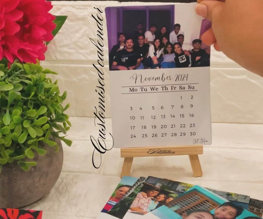 I create custom desk calendars using your 12 favorite photos. This version includes a set of monthly cards and a small wooden easel, making it a beautiful and personal addition to any desk or shelf.
