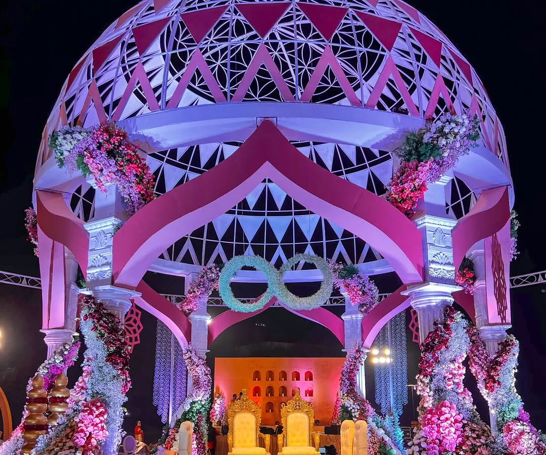 This is our 'Anant' theme, symbolizing an endless love. The magnificent dome mandap, inspired by the sacred Flower of Life, creates a truly spiritual and awe-inspiring centerpiece for the wedding ceremony.