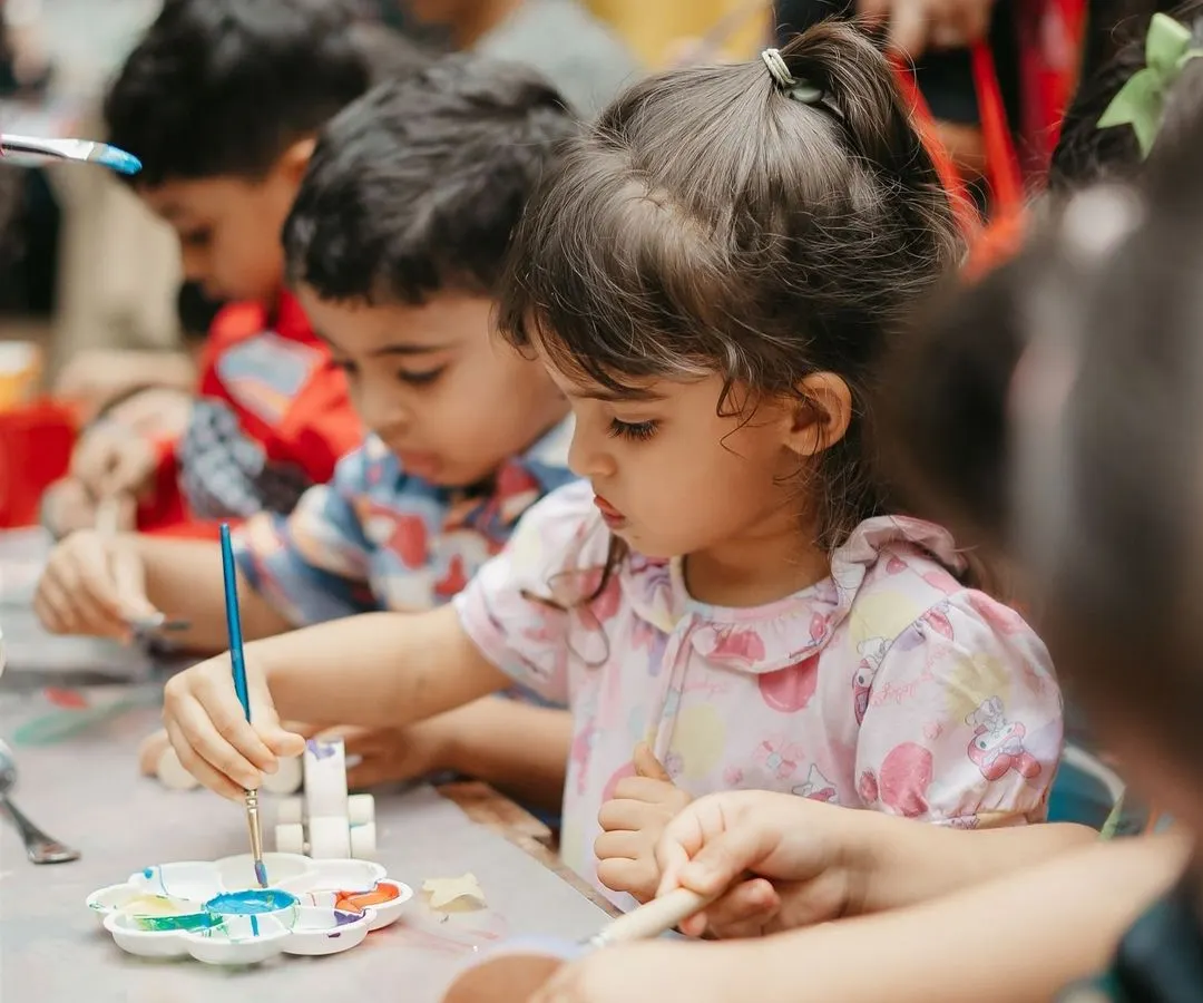 This is the magic moment. We provide all the supplies and a little guidance, then watch as each child gets completely absorbed in their own creative world.