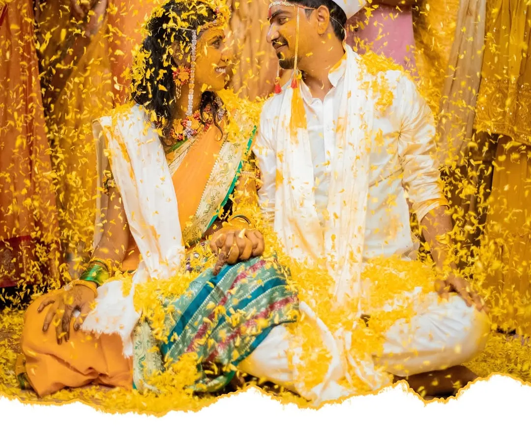 The pure, unadulterated joy of a Haldi ceremony, as a shower of marigold petals rains down on the happy couple. I focus on capturing the energy and vibrant colors of these pre-wedding rituals.