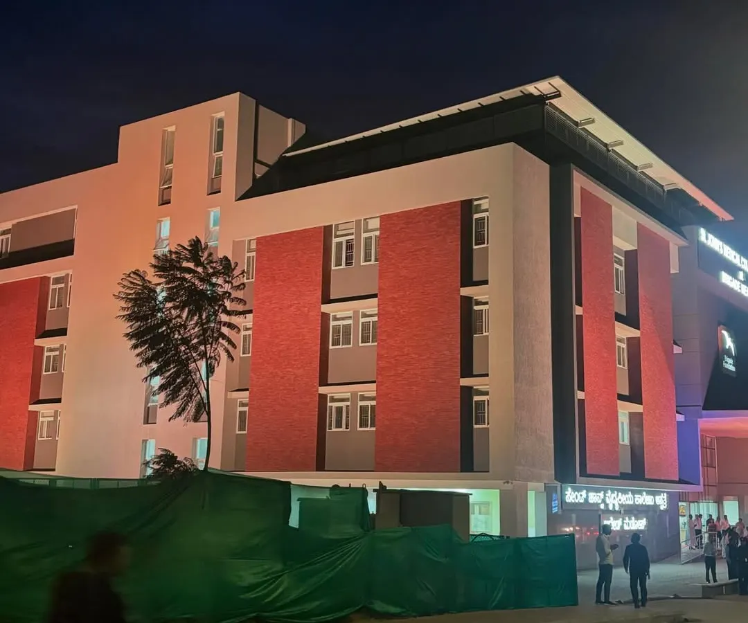 The completed St. John’s Hospital on Kanakpura Road, illuminated at night. This project showcases my capability in handling large-scale institutional architecture, blending modern functionality with a welcoming design aesthetic.