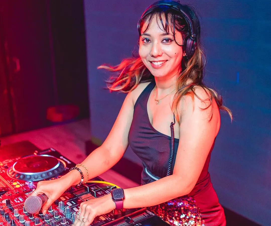 A smile on my face and my hands on the mixer, this is me in my element. I focus on reading the room and playing the right track at the right time to keep the party going all night long.