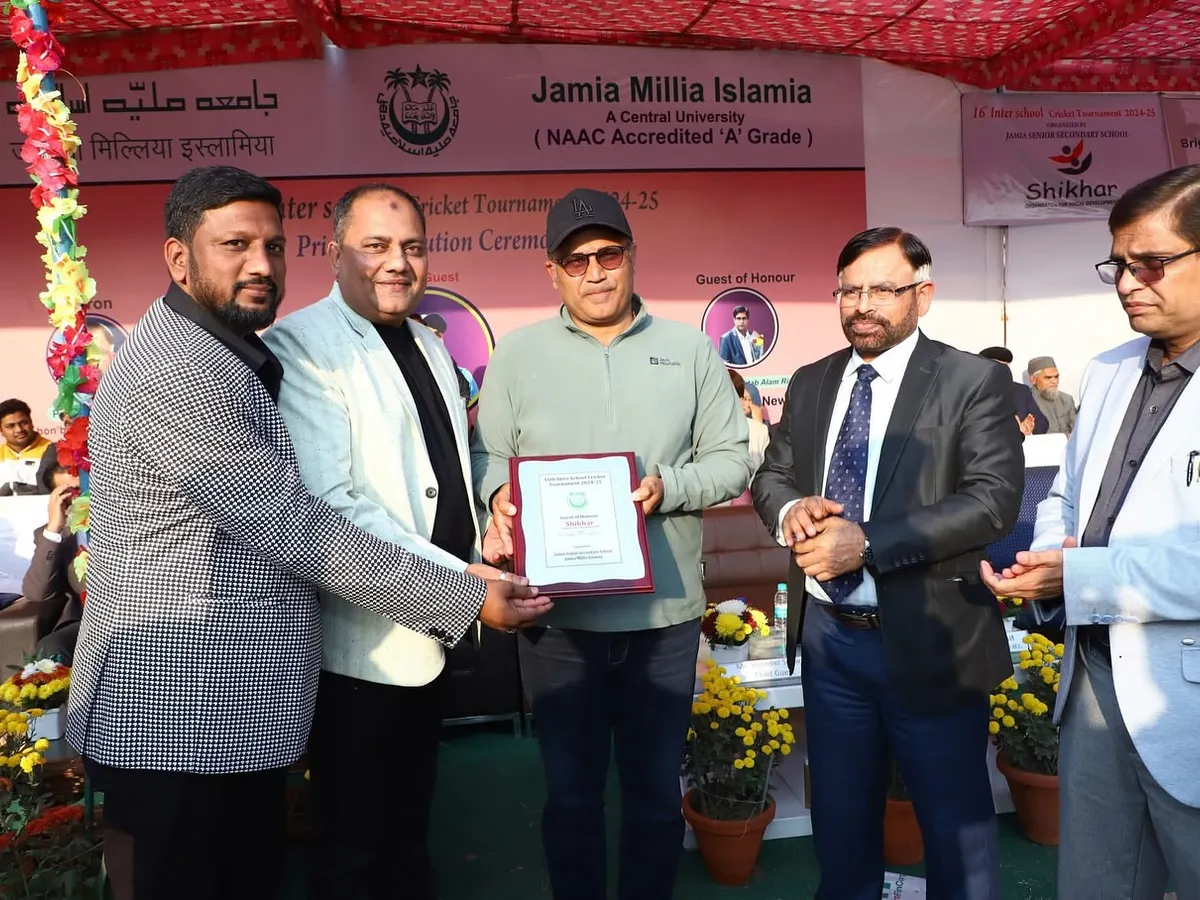 It is an honor to host legends of the game. Here, I am with Jamia alumnus and cricket icon Virender Sehwag during the prize distribution ceremony for the Inter-School cricket tournament, an event we managed from start to finish.