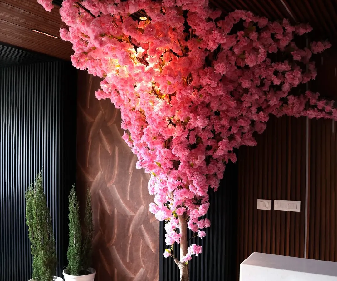 This stunning artificial Cherry Blossom tree brings everlasting spring indoors. We custom-design and install magnificent statement trees like this for homes, cafes, and commercial spaces, creating a breathtaking focal point with zero maintenance.