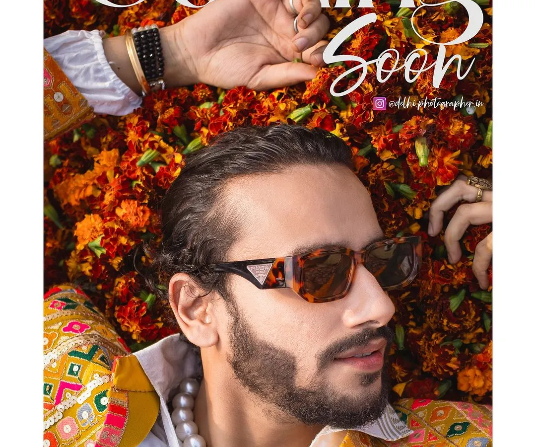 This was a creative shot for a Times Fashion Week campaign, styled by Nikheil & Rivendra. We used a bed of marigolds to create a vibrant, textured backdrop that contrasts with the model's sharp, high-fashion look.