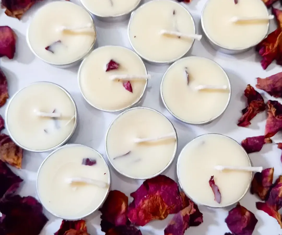 I love adding natural elements to my candles. These scented soy wax tealights are infused with real, air-dried rose petals, adding a touch of romance and a beautiful look to each hand-poured candle.