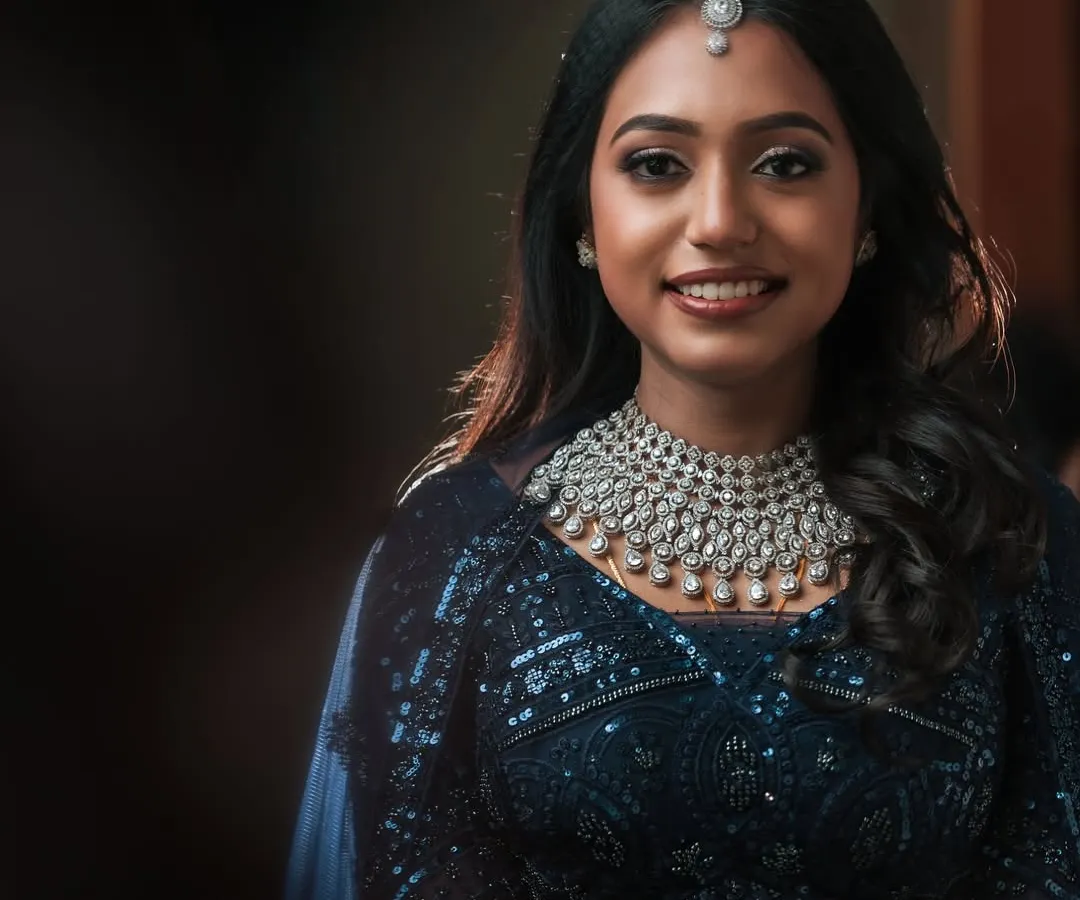 For a modern reception or sangeet, a sparkling American diamond necklace set like this one makes a stunning statement. This rental piece is perfect for lehengas and gowns, giving you a glamorous look for your special evening.